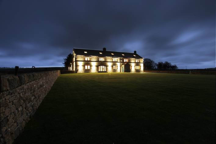 external view of Spicer Manor at night