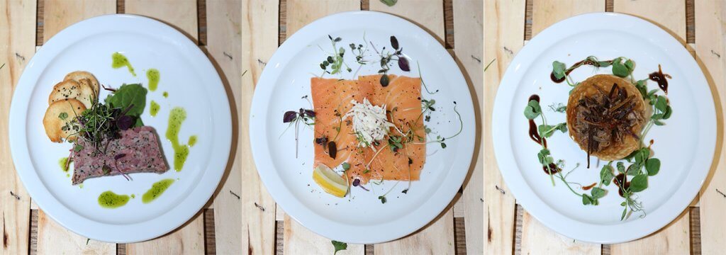 Three plates with professionally presented starters