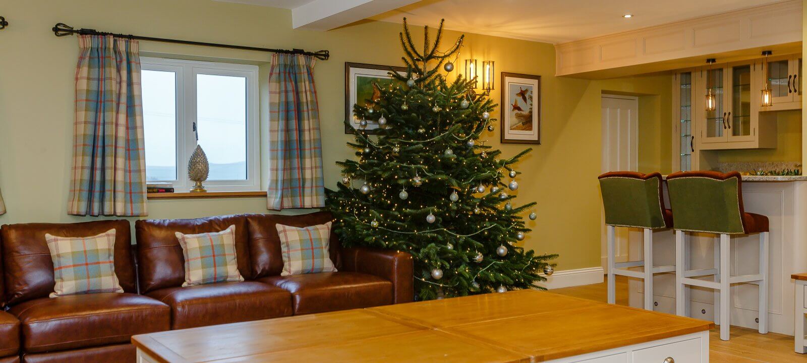 Christmas tree in lounge showing bar area