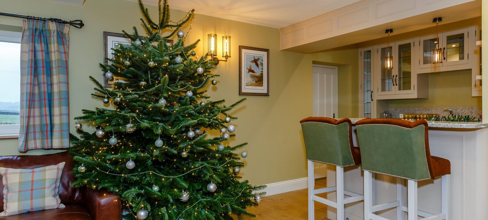 Christmas tree in lounge showing bar area