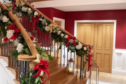 Garland of flowers decorating staircase