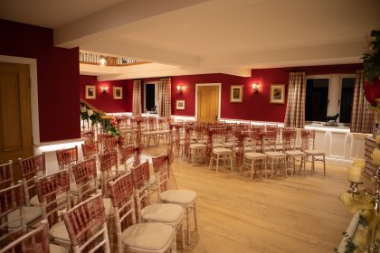 Hall with chairs arranged for ceremony