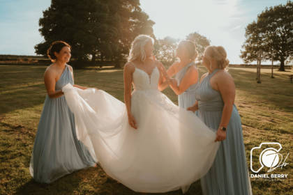 A bride and bridesmaids outdoors