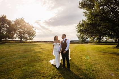 bridal couple in an outdoor setting