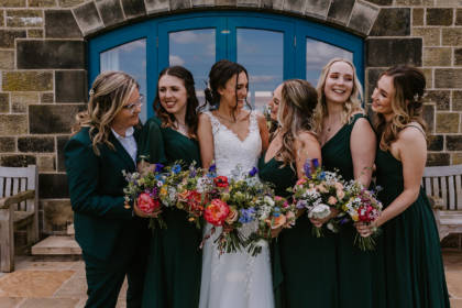 bride and bridesmaids with their bouquets