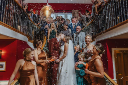 bridal party on the stairs at Spicer Manor